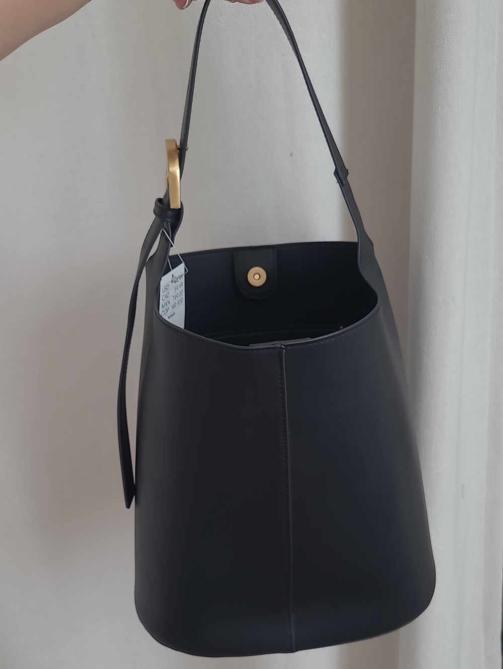Black Leather Bucket Bag with Gold Accent